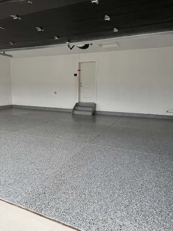 Two-car garage floor coating with flake epoxy finish in Sandy Springs, GA