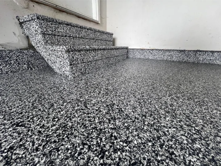 Decorative flake epoxy coating on a garage staircase in Buckhead, Atlanta