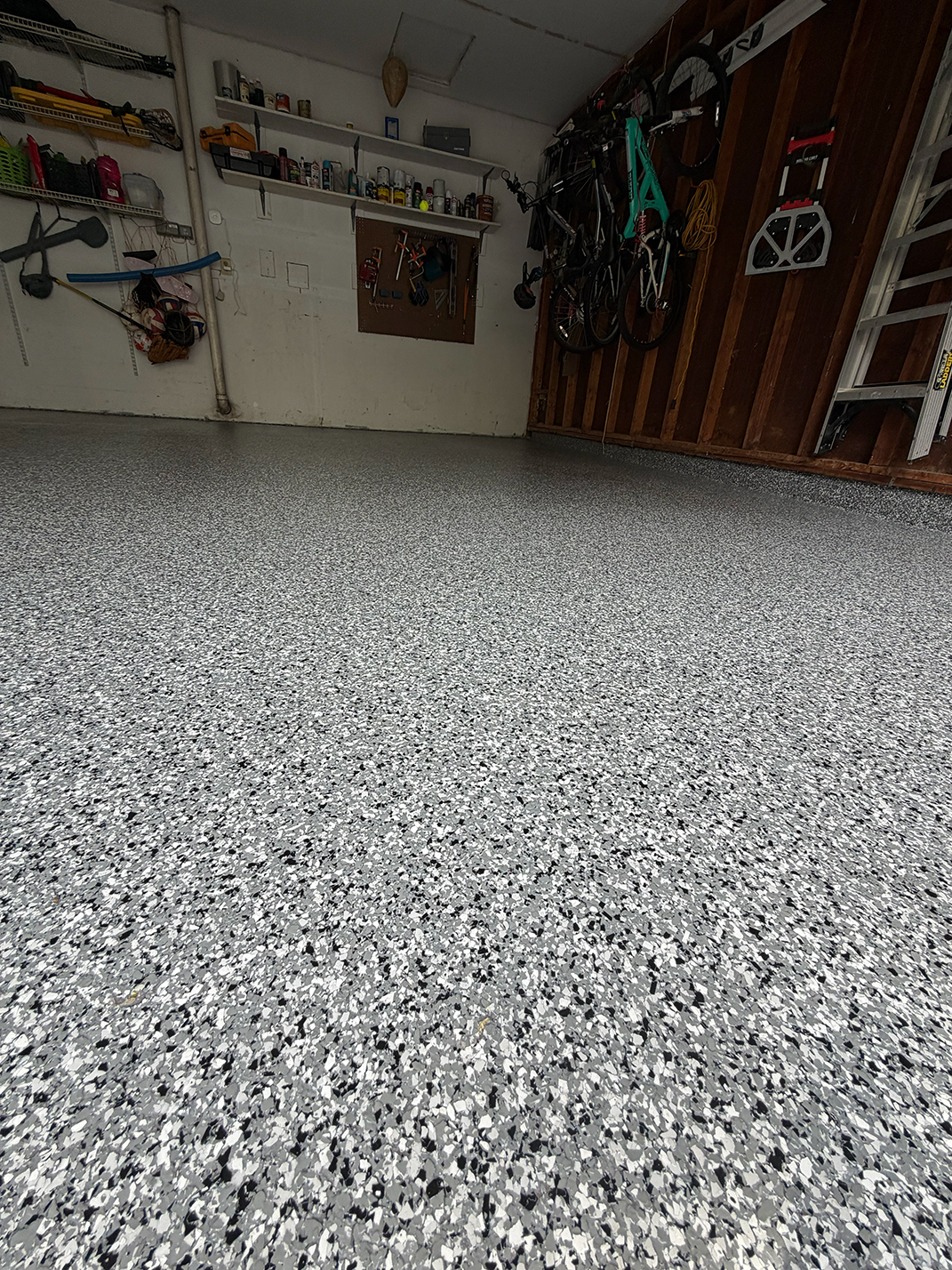 Premium flake epoxy garage floor after coating